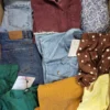 The photo shows a package with clothing in the category TSC.