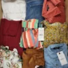 The photo shows a package with clothing in the category TSC.