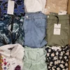The photo shows a package with clothing in the category TSC.