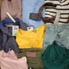 The photo shows a package with clothing in the category TSC.