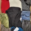 The photo shows a package with clothing in the category TSC.