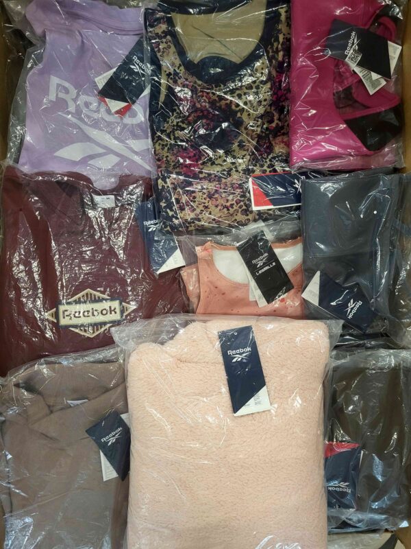 The photo shows a package with clothing in the category R.
