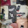 The photo shows a package with clothing in the category R.