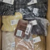 The photo shows a package with clothing in the category YA.