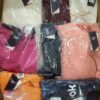 The photo shows a package with clothing in the category R.