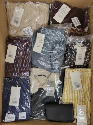 The photo shows a package with clothing in the category YA.