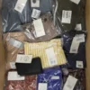 The photo shows a package with clothing in the category YA.