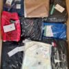 The photo shows a package with clothing in the category AM.
