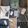 The photo shows a package with clothing in the category AM.