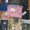 The photo shows a package with clothing in the category AM.