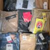 The photo shows a package with clothing in the category AM.