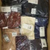 The photo shows a package with clothing in the category YA.