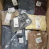 The photo shows a package with clothing in the category YA.