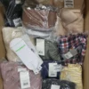 The photo shows a package with clothing in the category YA.