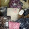 The photo shows a package with clothing in the category AR.