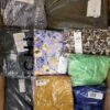 The photo shows a package with clothing in the category AR.