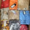 The photo shows a package with clothing in the category AR.