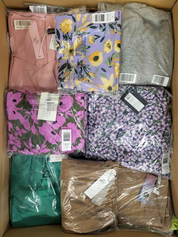 The photo shows a package with clothing in the category AR.