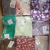 The photo shows a package with clothing in the category AR.
