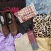 The photo shows a package with clothing in the category SN.