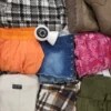 The photo shows a package with clothing in the category SN.