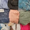The photo shows a package with clothing in the category SN.