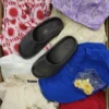 The photo shows a package with clothing in the category SN.