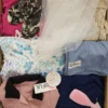 The photo shows a package with clothing in the category SN.