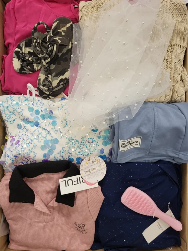 The photo shows a package with clothing in the category SN.