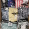 The photo shows a package with clothing in the category AW.