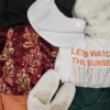 The photo shows a package with clothing in the category SN.