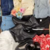 The photo shows a package with clothing in the category SN.