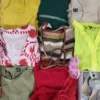 The photo shows a package with clothing in the category SN.