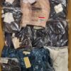 The photo shows a package with clothing in the category AP.