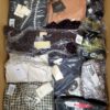 The photo shows a package with clothing in the category AP.
