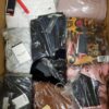 The photo shows a package with clothing in the category AP.