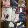 The photo shows a package with clothing in the category AP.
