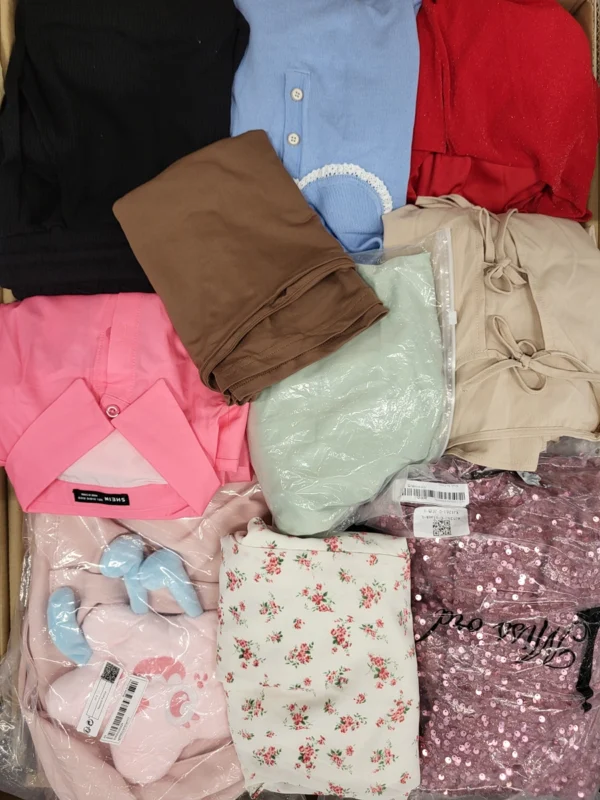 The photo shows a package with clothing in the category SN.