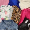 The photo shows a package with clothing in the category SN.