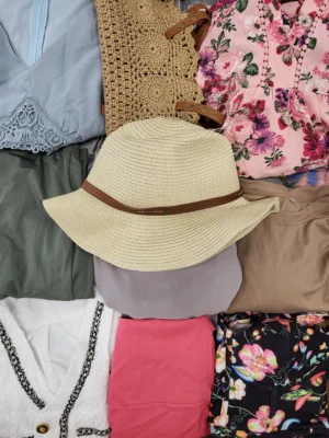 The photo shows a package with clothing in the category SN.