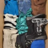 The photo shows a package with clothing in the category BSN.