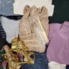 The photo shows a package with clothing in the category SN.