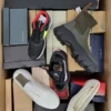 The photo shows a package with footwear in the category AS.