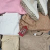 The photo shows a package with clothing in the category BSN.