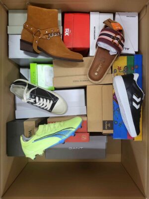 The photo shows a package with footwear in the category AS.