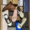 The photo shows a package with footwear in the category AS.