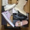 The photo shows a package with footwear in the category AS.