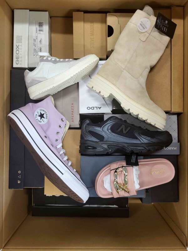 The photo shows a package with footwear in the category AS.