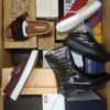 The photo shows a package with footwear in the category AS.