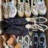 The photo shows a package with footwear in the category SH.